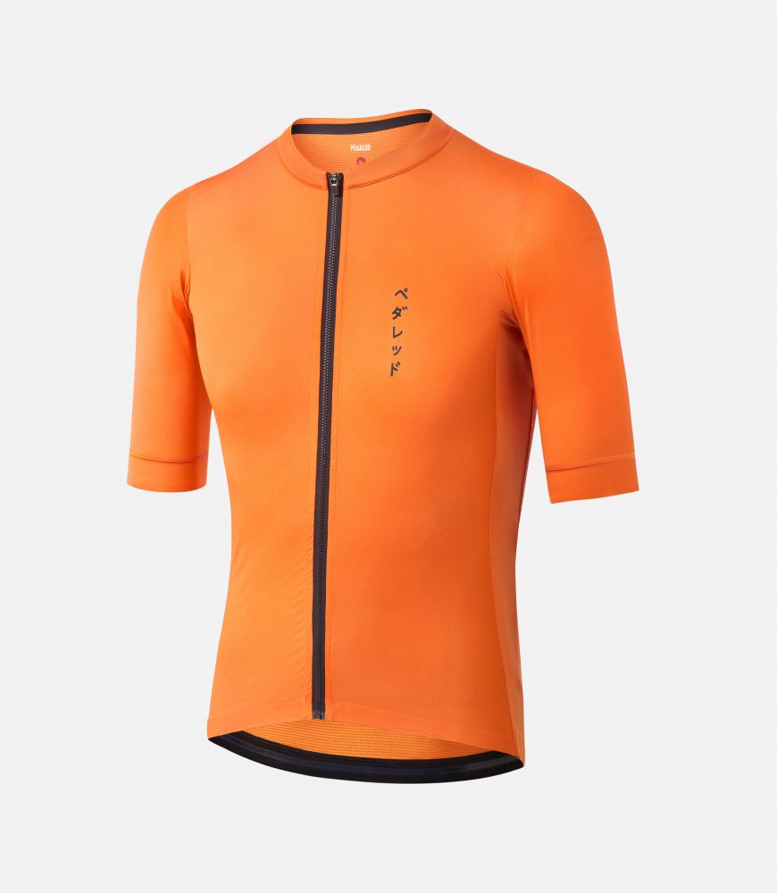 men cycling jersey orange front mirai pedaled