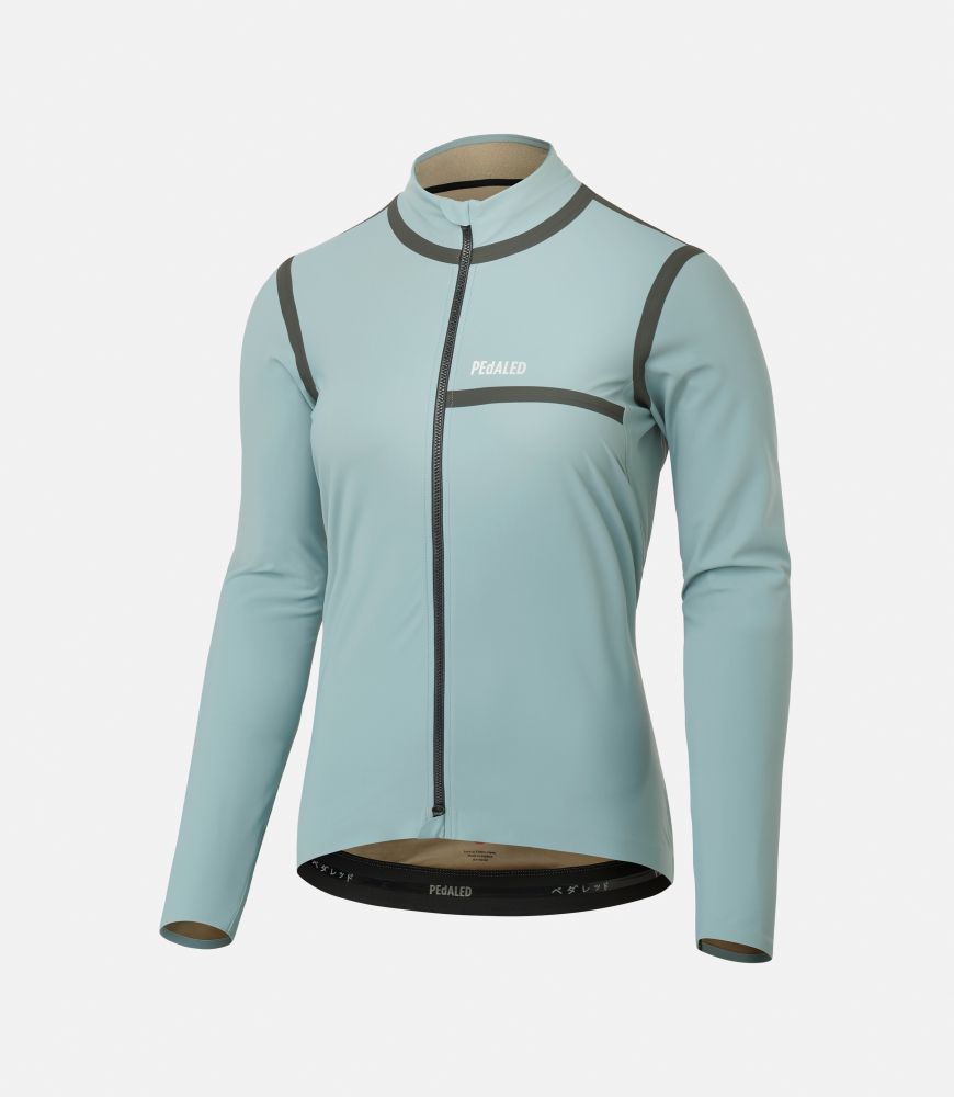women cycling jacket waterproof azure odyssey still life front pedaled