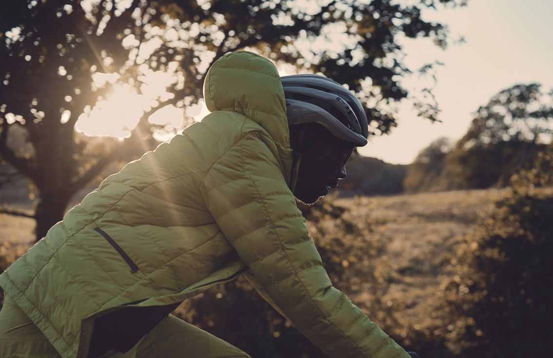 insulated cycling jacket adventure odyssey lime in action pedaled
