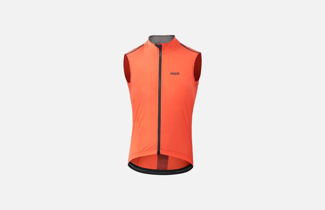 nest men cycling vest brick red front mirai pedaled still life
