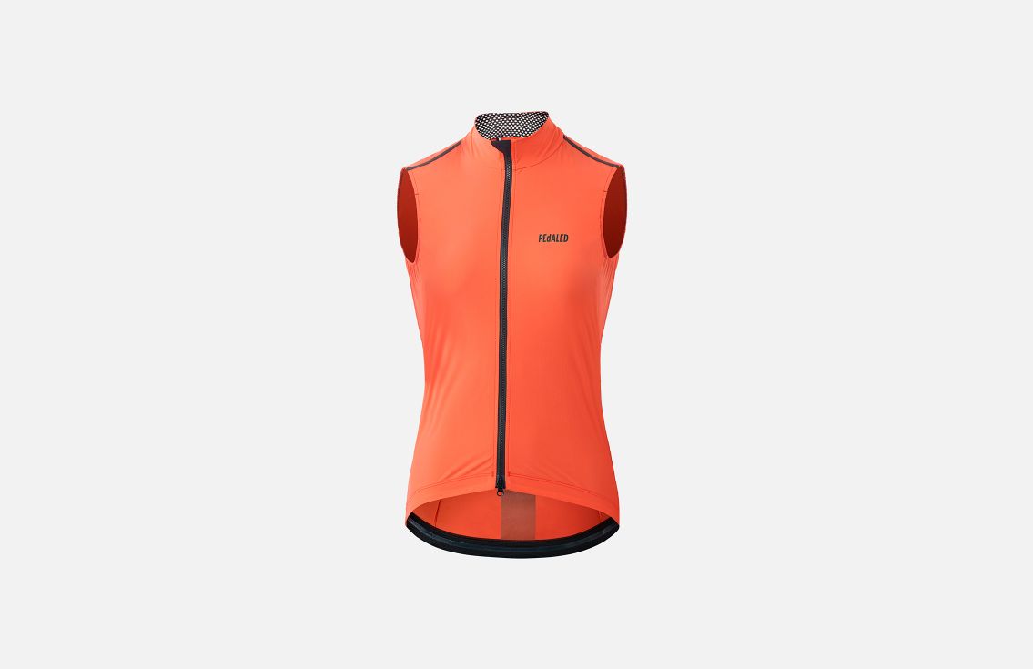 nest women cycling vest brick red front mirai pedaled still life