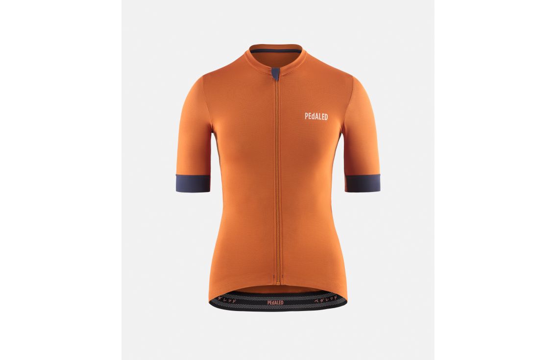 women cycling jersey orange essential front pedaled