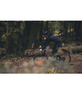 all road merino hooded jersey raven jary in action pedaled