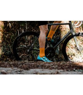 men cycling socks orange front mirai in action pedaled