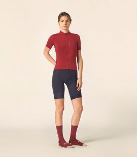 woman cycling jersey red mirai total body front pedaled