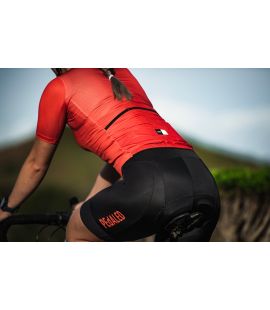woman lightweight cycling jersey brick red mirai side view pedaled action