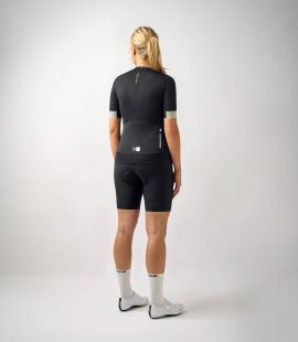 women cycling jersey black essential total body back | PEdALED
