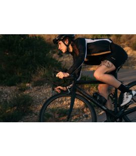 women packable cycling jacket black vesper pedaled action