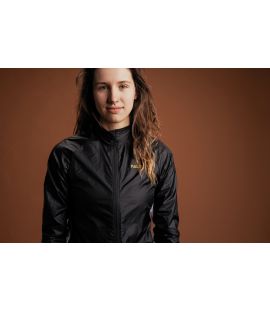 women packable cycling jacket black vesper pedaled detail top