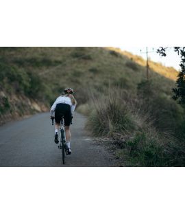 women packable cycling jacket white vesper pedaled back