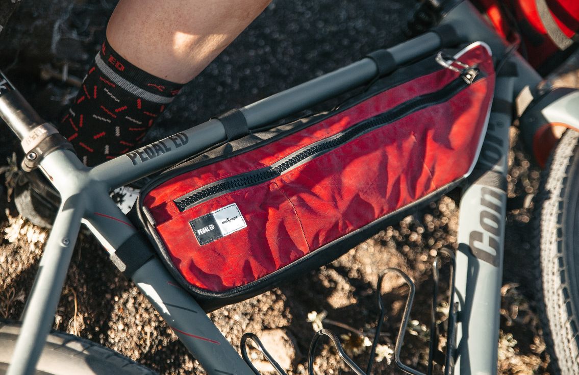men internode cycling half frame bag coral red odyssey pedaled detail